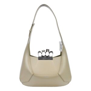 Beige handbag with decorative handle