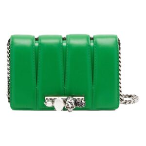 Elegant green bag featuring skull embellishment.