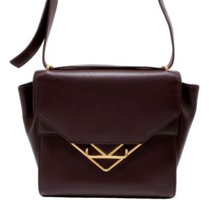 Brown leather handbag with gold accent