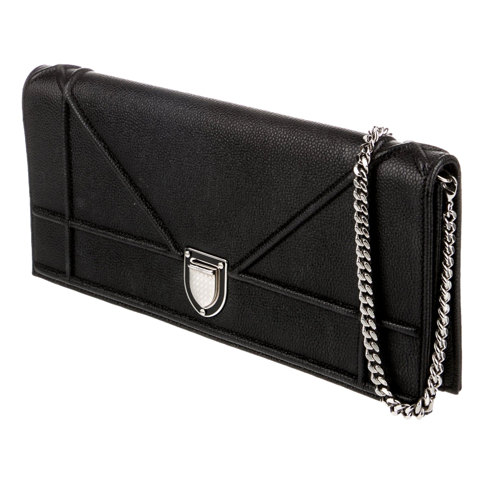 Stylish clutch bag featuring silver hardware.