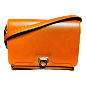 Orange leather handbag with strap
