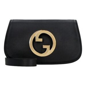 Stylish black purse featuring gold accent