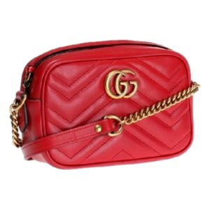 Red quilted handbag with gold chain