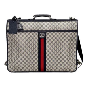 Designer patterned bag with red stripe