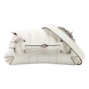 Stylish white bag featuring metal hardware