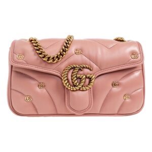 Pink designer handbag with gold chain