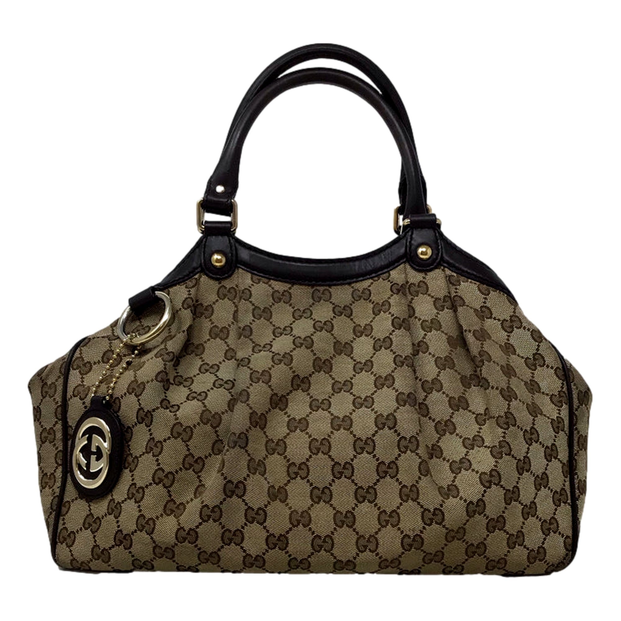 Designer patterned handbag with double handles