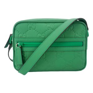 Green crossbody bag with embossed pattern
