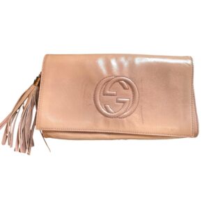 Pink clutch with tassel detail