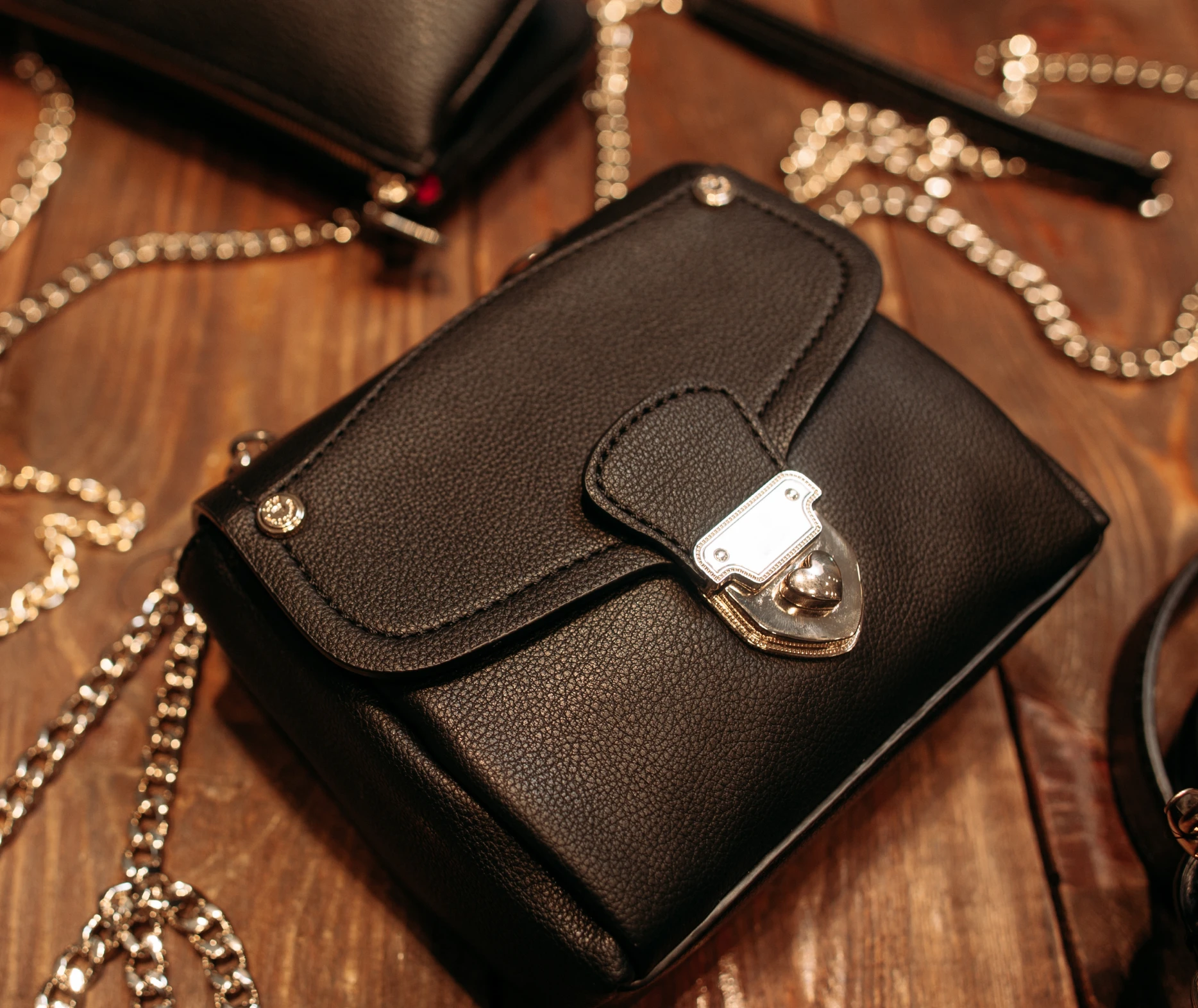 Black leather purse with chain strap