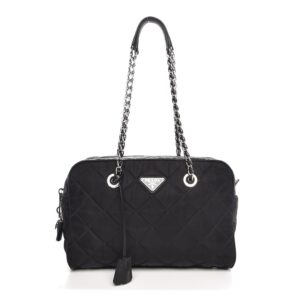 Black quilted handbag with chain straps.