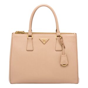 Beige designer handbag with gold accents
