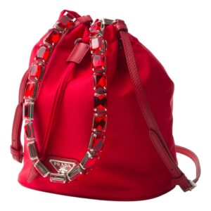 Red drawstring bag with jeweled strap