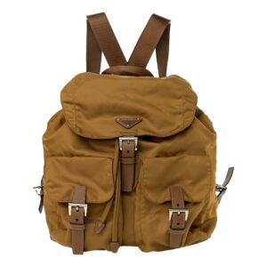 Brown leather backpack with buckle straps