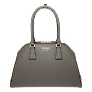 Stylish Prada handbag on white background