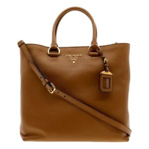 Brown leather handbag with shoulder strap
