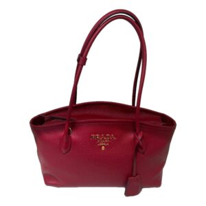 Red leather handbag with gold logo