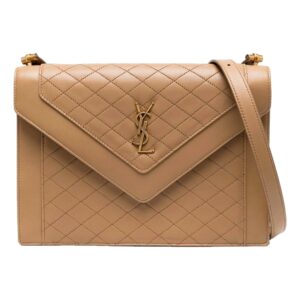 Stylish quilted tan purse with strap