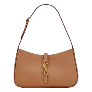 Tan designer handbag with gold accents