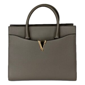Elegant handbag with curved pocket design